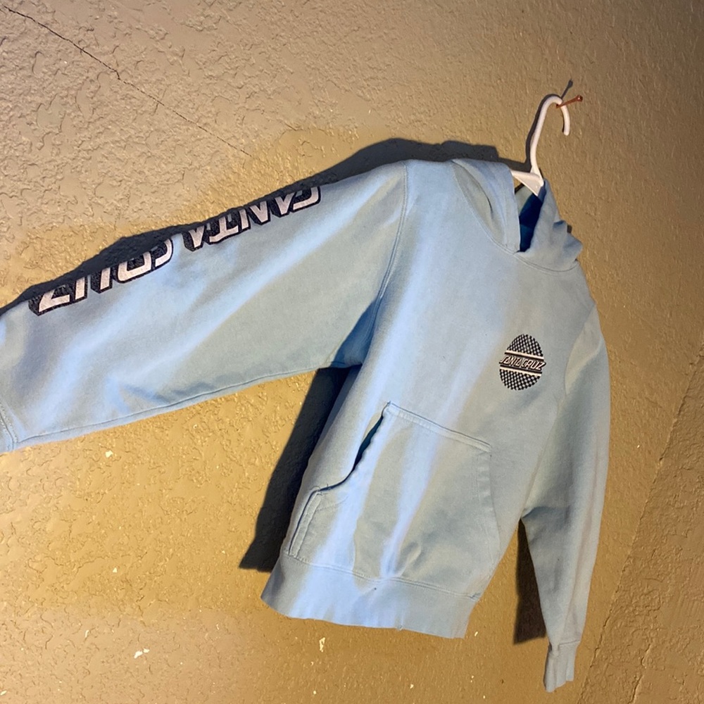 Is Santa Cruz jacket The color of the jacket is teal